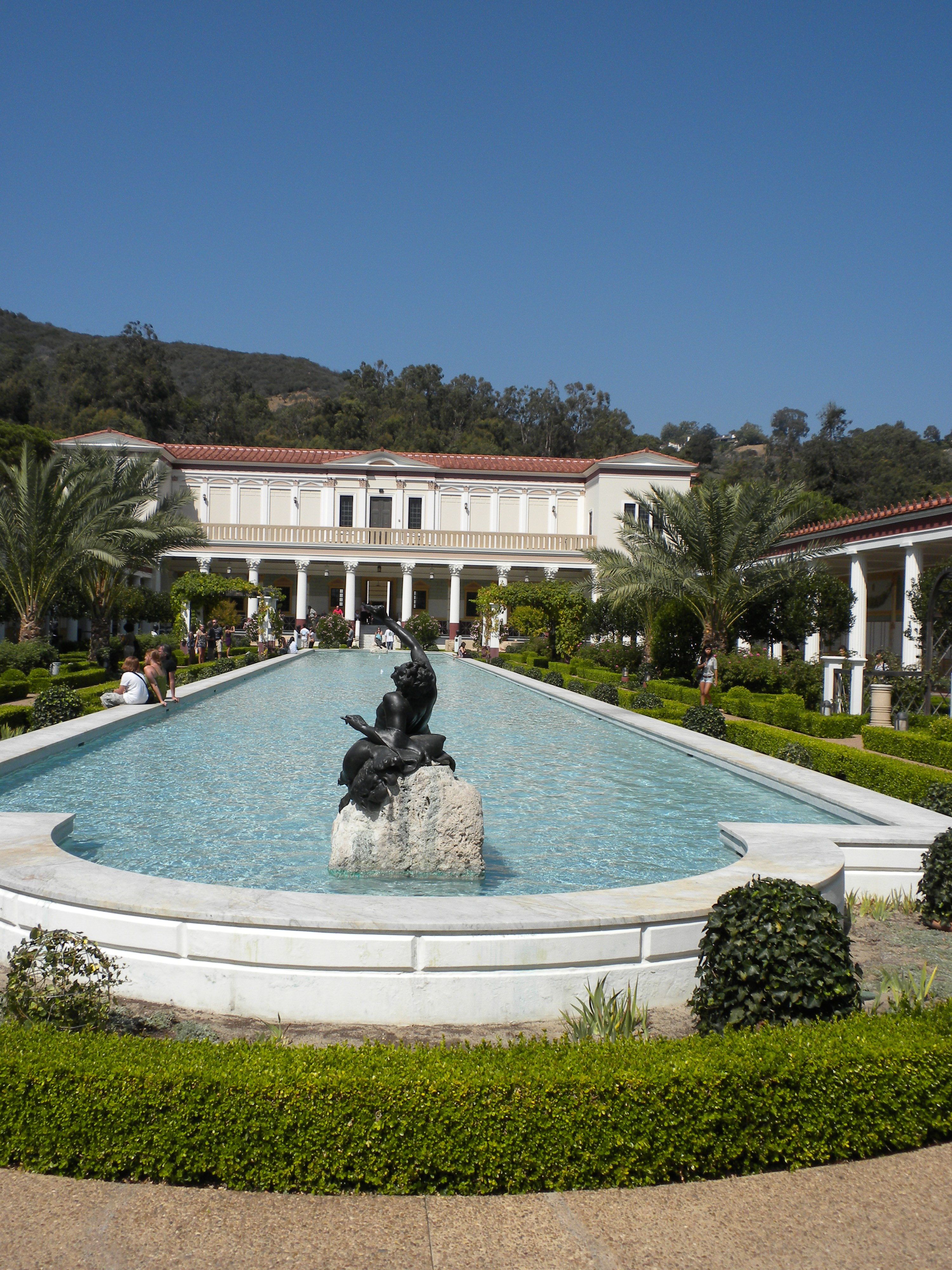 How the Roman One Percent (1%) lived: pool at Getty Villa in Malibu, CA near our HQ. #water #statue #tree #trees #mountain #hill #blue Photo credit: (C) Acculation